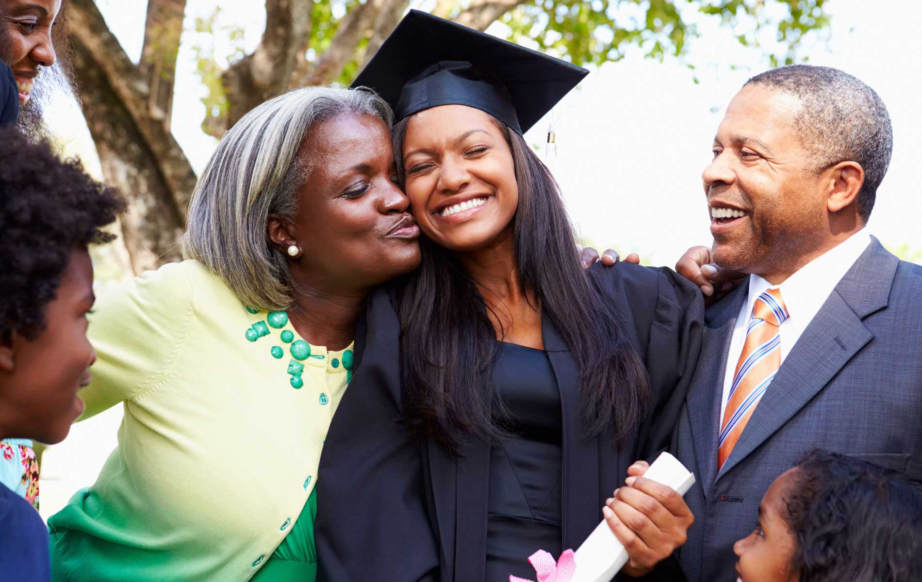 A recent college graduate celebrating with their family.